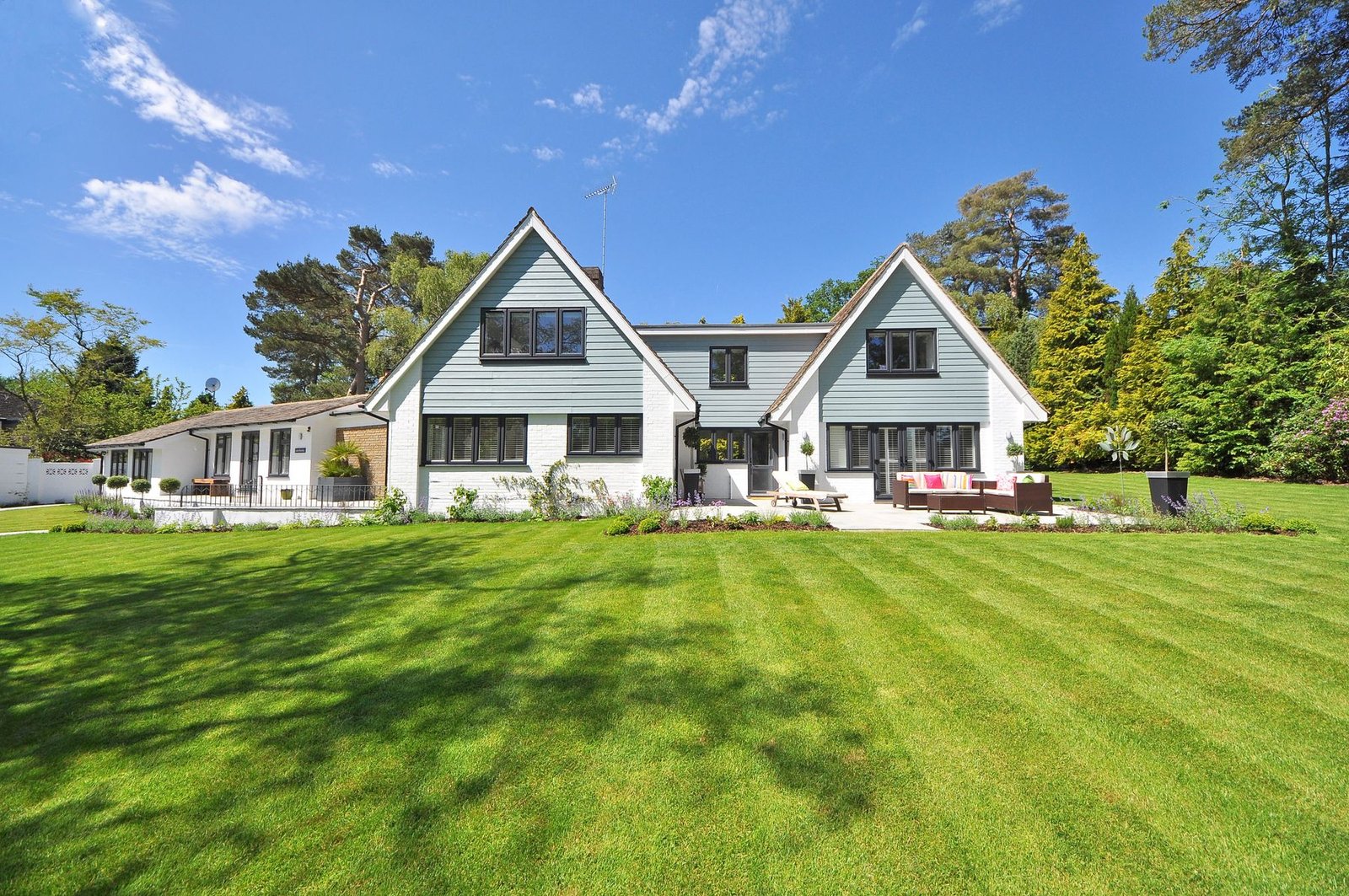 Home with a new dark architectural shingle roof